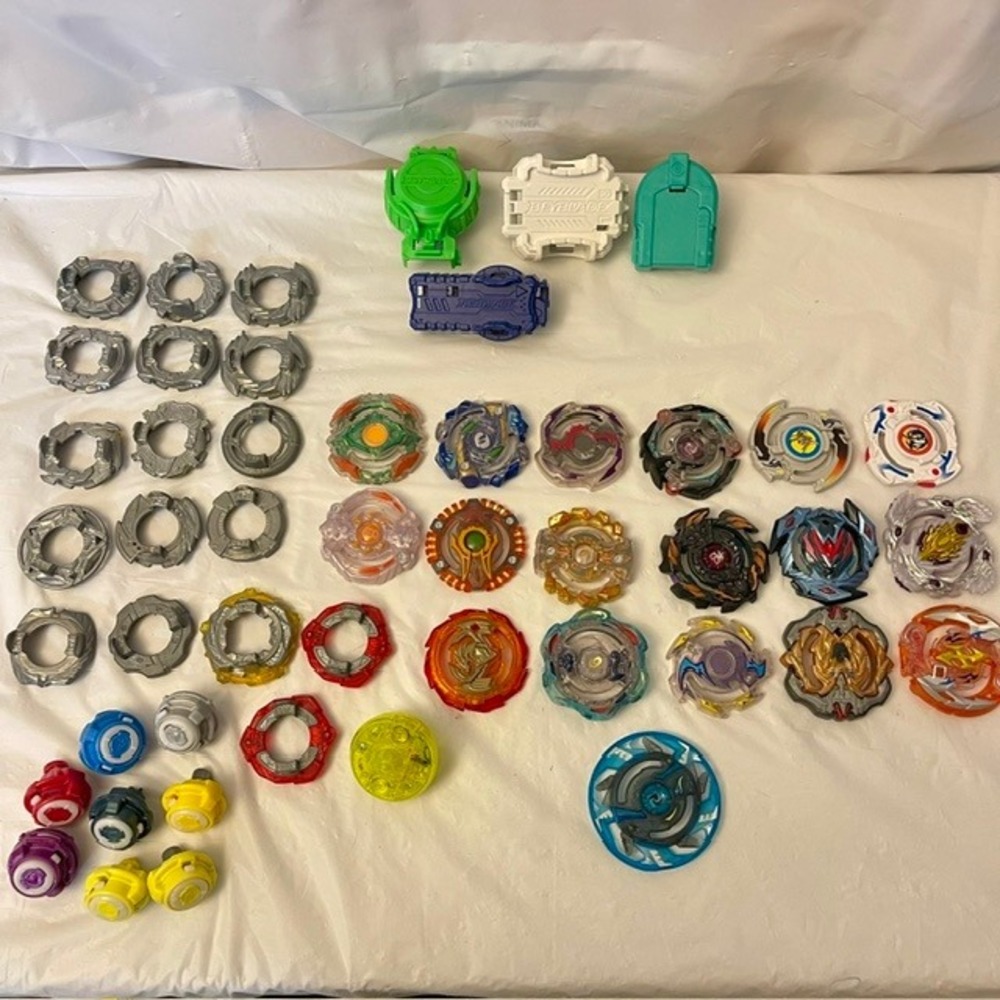 Huge Beyblade Burst Lot 48Pc Launchers Layers Discs Tips Multicolored Set
